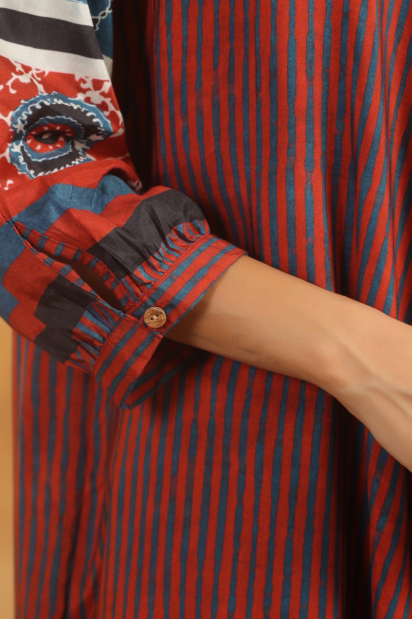 Rust Muslin Flared Kurti with Printed Sleeves for Women